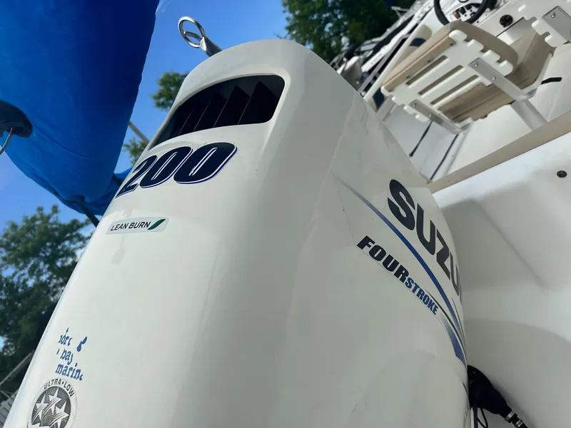 Slide: The Image of Outboard motor on 2016 Godfrey Hurricane Sundeck SS211 Center Console boat. - 37