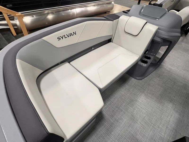 Slide: The Image of 2025 Sylvan A-Series A20 LZ DH boat interior with sleek seating and cup holders. - 13