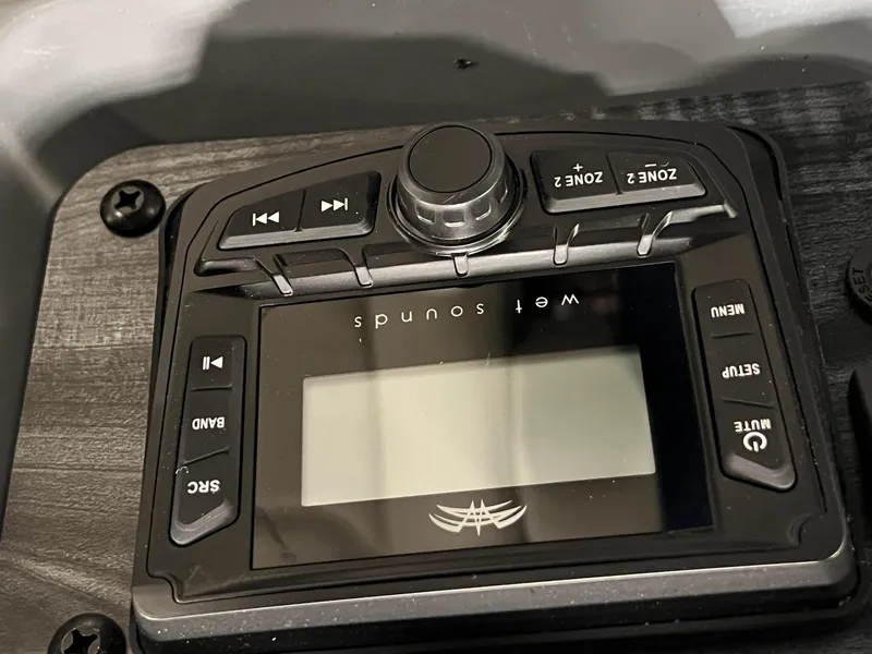 Slide: The Image of Control panel of a 2025 Sylvan A-Series A20 LZ DH boat audio system. - 14