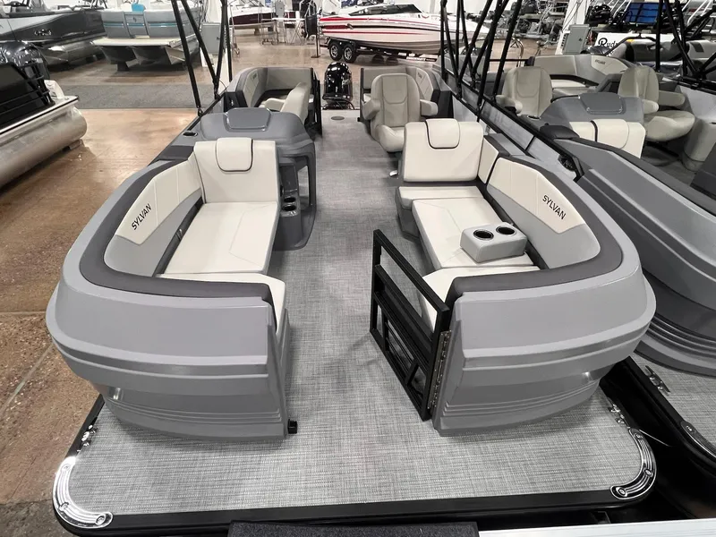 Slide: The Image of 2025 Sylvan A-Series A20 LZ DH pontoon boat with spacious seating and modern design. - 16