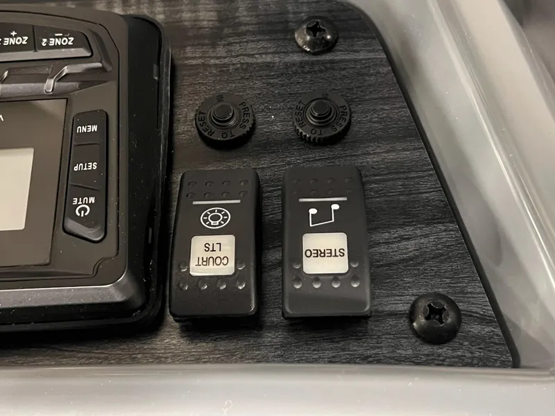 Slide: The Image of Control panel of 2025 Sylvan A-Series A20 LZ DH with stereo and light switches. - 18