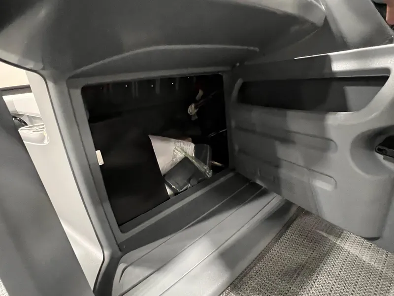 Slide: The Image of Open storage compartment in 2025 Sylvan A-Series A20 LZ DH boat. - 21