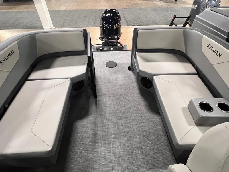 Slide: The Image of Interior of 2025 Sylvan A-Series A20 LZ DH boat with gray seating and cup holders. - 3