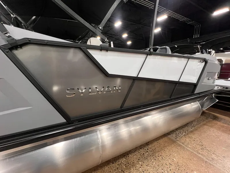 Slide: The Image of 2025 Sylvan A-Series A20 LZ DH pontoon boat, sleek design, showroom display. - 4