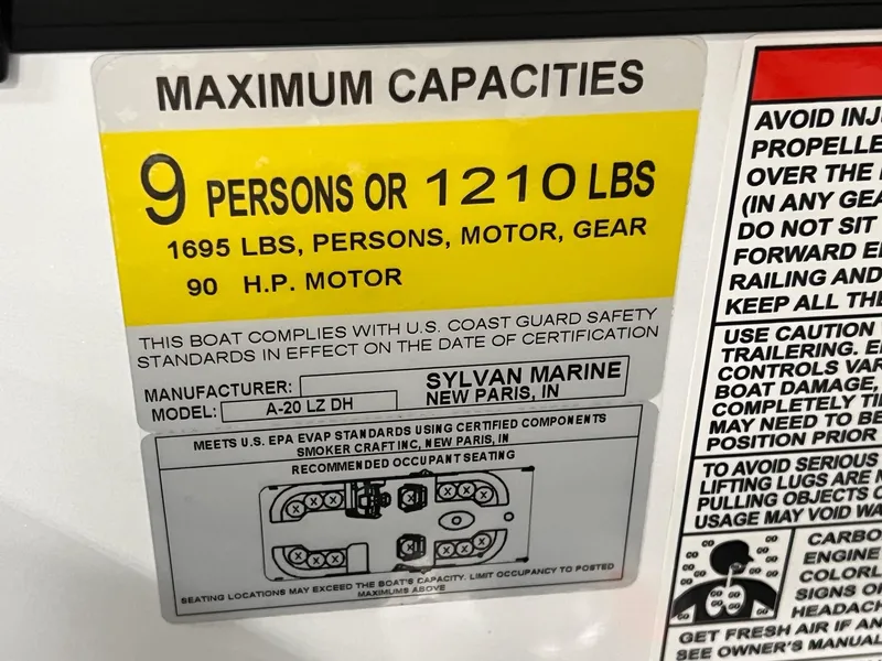Slide: The Image of 2025 Sylvan A-Series A20 LZ DH boat capacity label: 9 persons or 1210 lbs, 90 HP motor. - 6