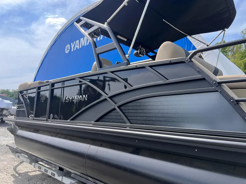 Slide: The Image of 2025 Sylvan L3 CLZ DH WT pontoon boat with Yamaha canopy, side view. - 17