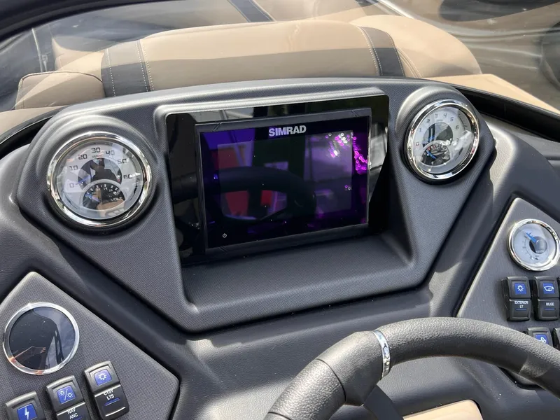 Slide: The Image of Dashboard of 2025 Sylvan L3 CLZ DH WT boat with Simrad display and gauges. - 20
