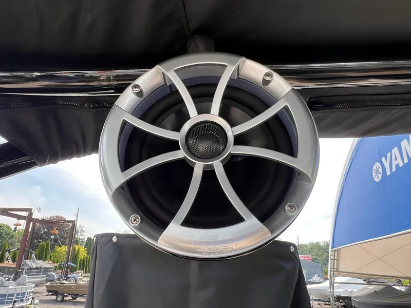 Slide: The Image of 2025 Sylvan L3 CLZ DH WT boat speaker with sleek design, outdoor setting. - 25