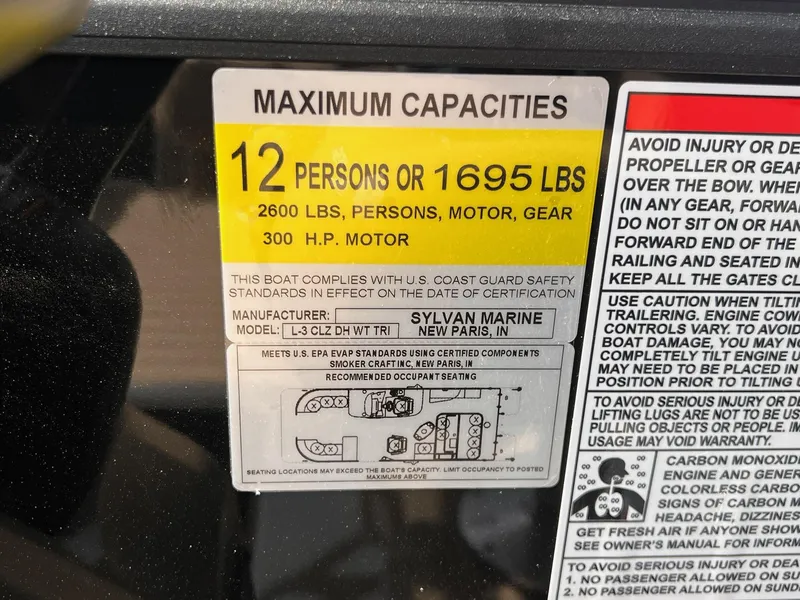 Slide: The Image of 2025 Sylvan L3 CLZ DH WT boat capacity label: 12 persons, 1695 lbs, 300 HP motor. - 27