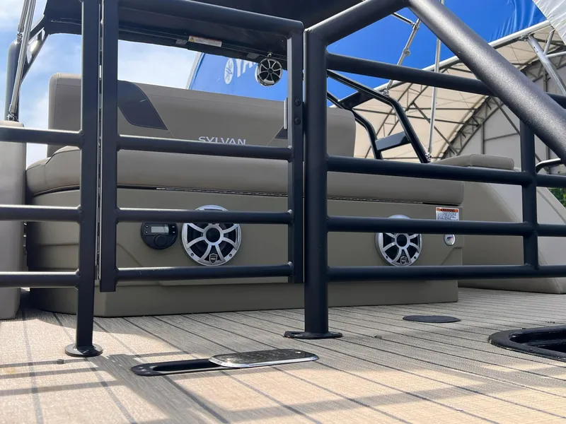 Slide: The Image of 2025 Sylvan L3 CLZ DH WT boat deck with speakers and seating. - 3