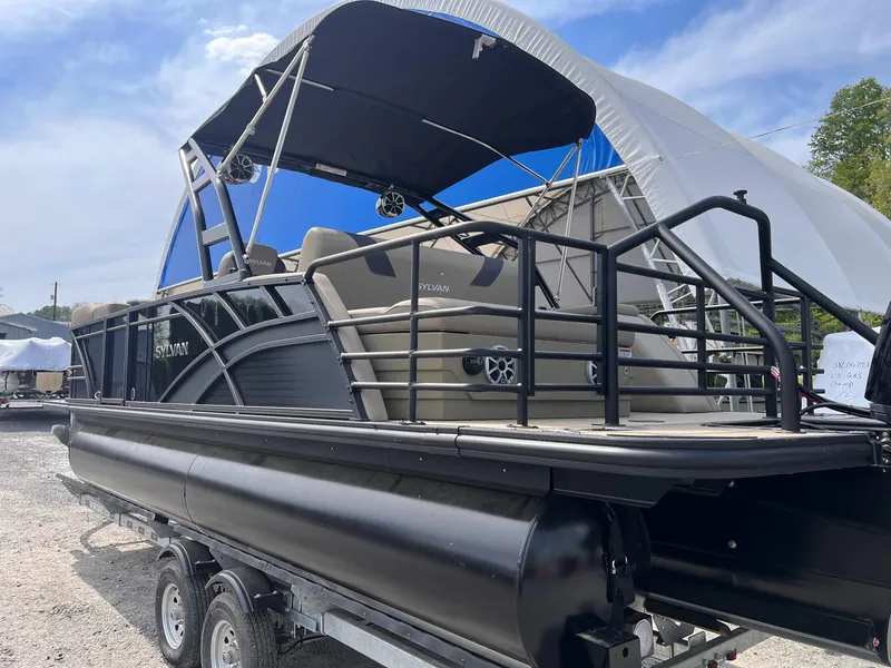 Slide: The Image of 2025 Sylvan L3 CLZ DH WT pontoon boat with canopy on trailer. - 39