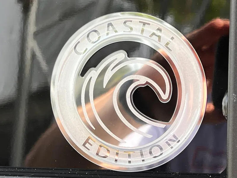 Slide: The Image of "Coastal Edition" logo on 2025 Sylvan L3 CLZ DH WT boat. - 44