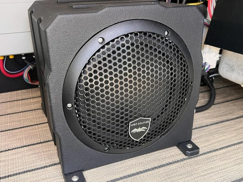 Slide: The Image of Black speaker with hexagonal grille, labeled "Wet Sounds," in a Sylvan L3 CLZ DH WT 2025. - 8