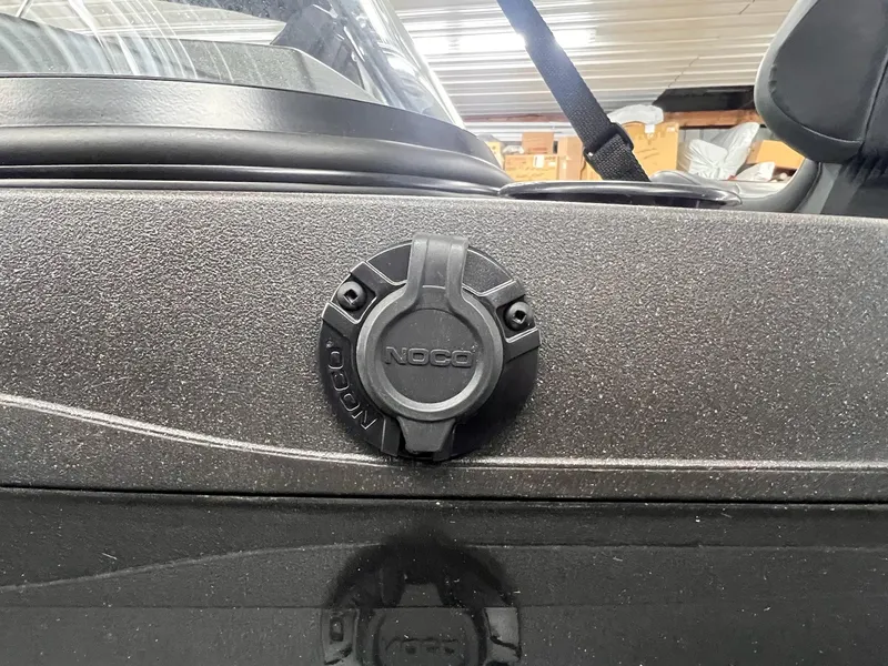 Slide: The Image of 2023 Tracker TARGA V-19 WT TE boat with NOCO charging port detail. - 15