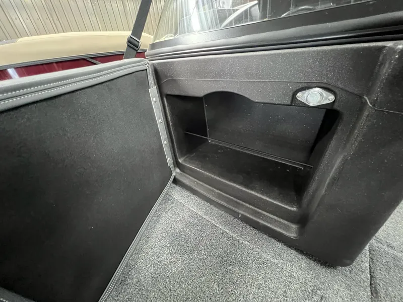 Slide: The Image of Storage compartment in 2023 Tracker TARGA V-19 WT TE boat, featuring durable interior design. - 16