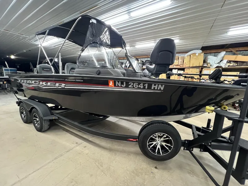 Slide: The Image of 2023 Tracker TARGA V-19 WT TE boat on trailer in indoor storage. - 19