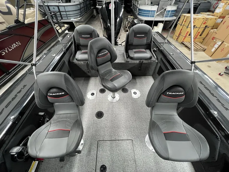 Slide: The Image of 2023 Tracker TARGA V-19 WT TE boat interior with five gray seats. - 30