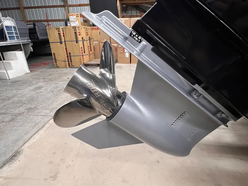 Slide: The Image of 2023 Tracker TARGA V-19 WT TE boat propeller in a storage area. - 37