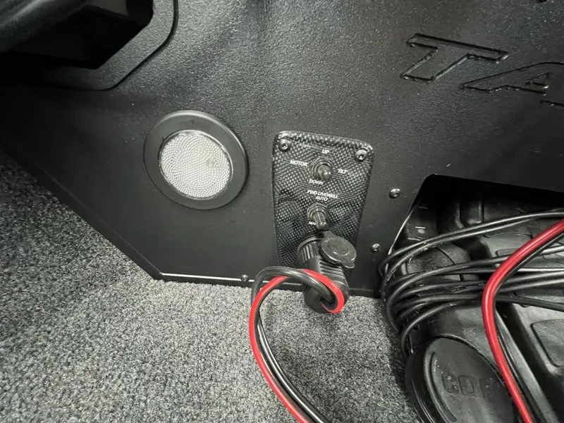 Slide: The Image of Control panel and wiring in 2023 Tracker TARGA V-19 WT TE boat interior. - 8