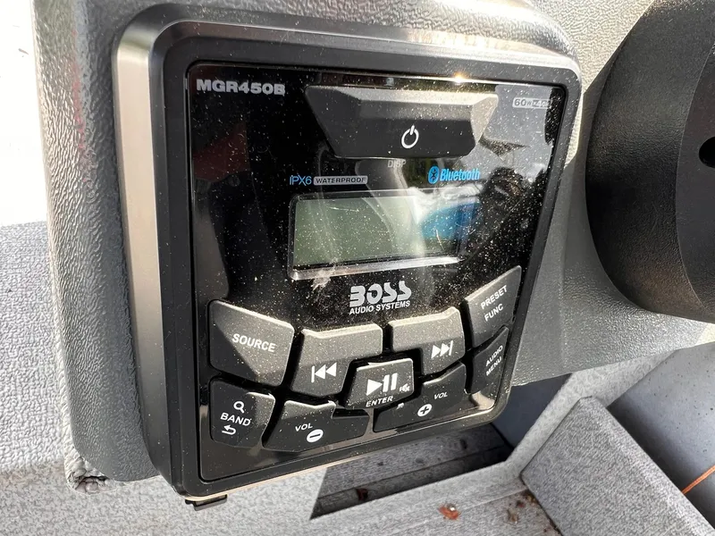 Slide: The Image of Boss audio system with Bluetooth in 2016 Crestliner 1650 Discovery Side Console boat. - 19
