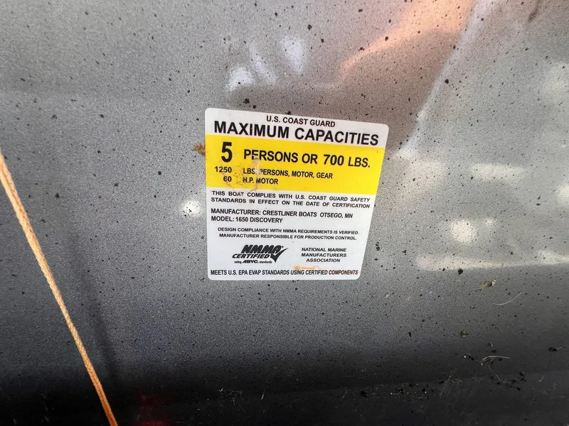 Slide: The Image of 2016 Crestliner 1650 Discovery Side Console capacity label, 5 persons or 700 lbs. - 26