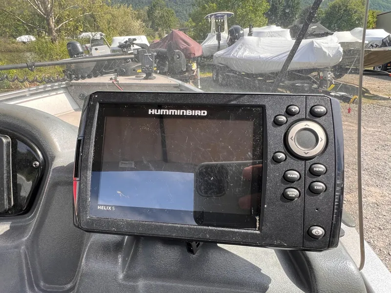Slide: The Image of Humminbird Helix 5 fish finder on 2016 Crestliner 1650 Discovery Side Console boat. - 5