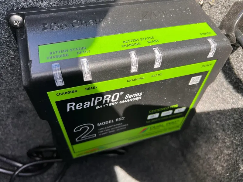 Slide: The Image of RealPRO Series battery charger in Starcraft Storm 176 DC Pro SE, 2025 model. - 13