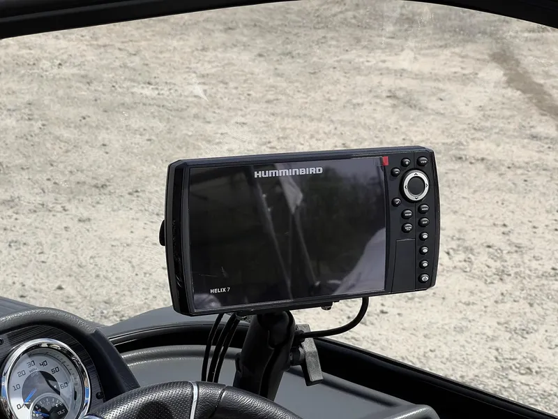 Slide: The Image of Humminbird Helix 7 fish finder on 2025 Starcraft Storm 176 DC Pro SE dashboard. - 16