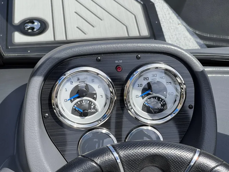 Slide: The Image of Dashboard of 2025 Starcraft Storm 176 DC Pro SE boat with gauges and steering wheel. - 21