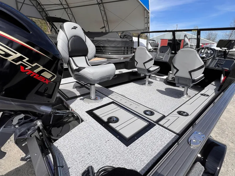 Slide: The Image of 2025 Starcraft Storm 176 DC Pro SE boat interior with modern seating and Yamaha VMAX engine. - 23