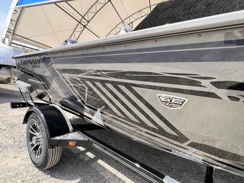 Slide: The Image of 2025 Starcraft Storm 176 DC Pro SE boat with sleek graphics and modern design. - 28