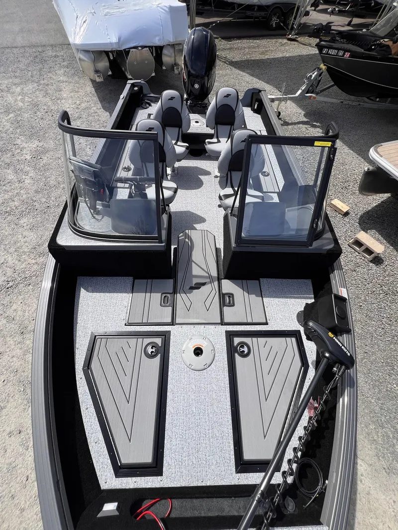 Slide: The Image of 2025 Starcraft Storm 176 DC Pro SE boat with modern seating and sleek design. - 30
