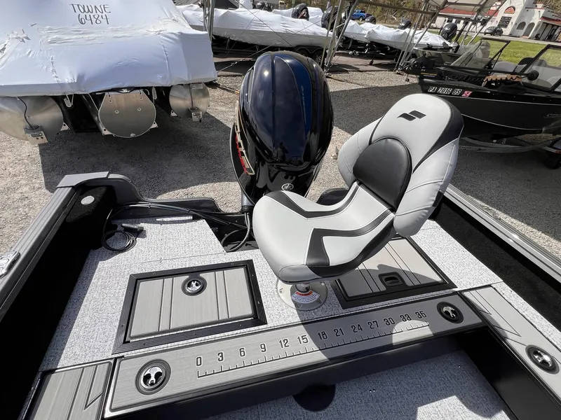 Slide: The Image of 2025 Starcraft Storm 176 DC Pro SE boat interior with seating and measurement panel. - 34