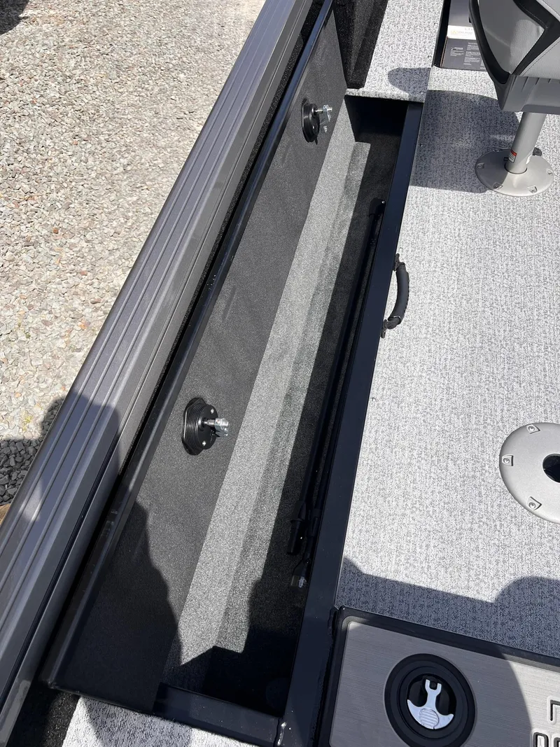 Slide: The Image of 2025 Starcraft Storm 176 DC Pro SE boat interior storage compartment. - 38