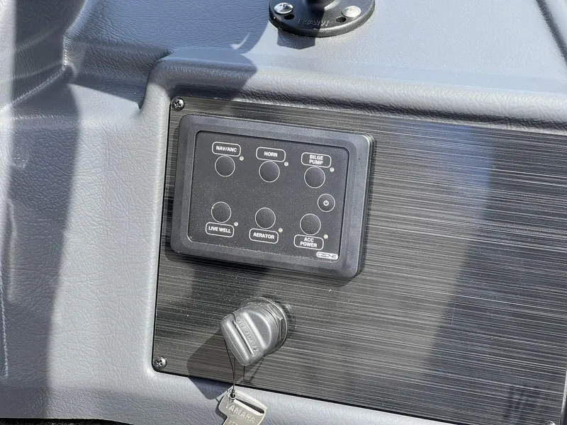 Slide: The Image of Control panel of 2025 Starcraft Storm 176 DC Pro SE boat with key ignition. - 41