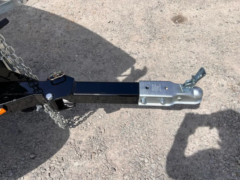 Slide: The Image of Trailer hitch of 2025 Starcraft Storm 176 DC Pro SE on gravel surface. - 8