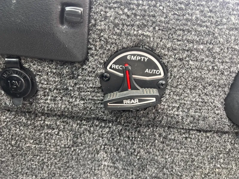 Slide: The Image of Control panel of a 2020 Ranger VS1782 WT boat with 12V outlet and gauge. - 18