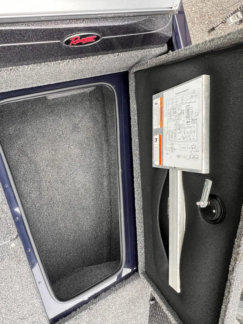Slide: The Image of 2020 Ranger VS1782 WT boat storage compartment with schematic diagram and carpeted interior. - 33