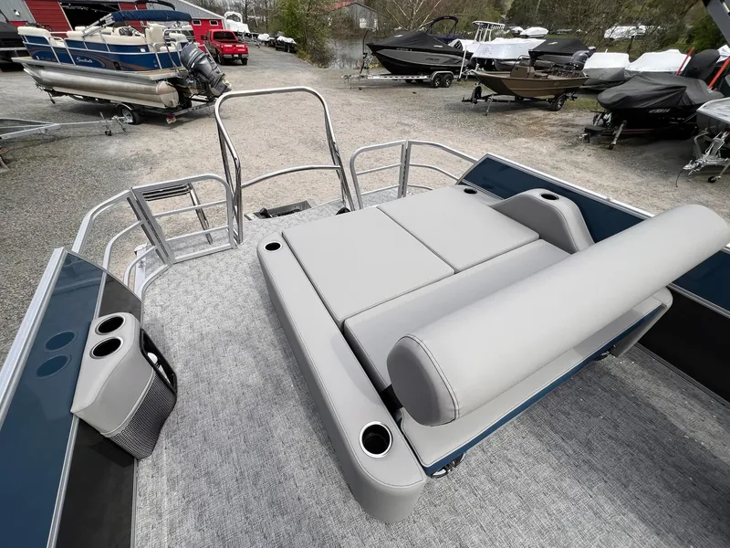Slide: The Image of 2025 Berkshire LE Series 24UL LE pontoon boat with spacious seating and cup holders. - 17