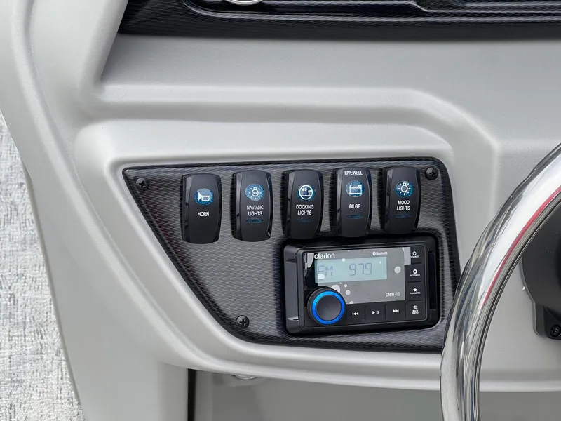 Slide: The Image of Control panel of 2025 Berkshire LE Series 24UL LE with switches and Clarion audio system. - 18