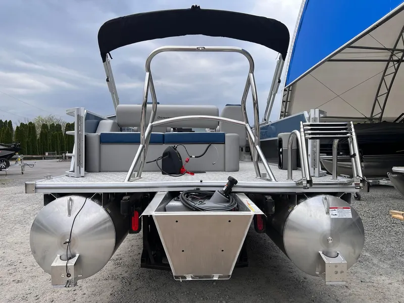 Slide: The Image of 2025 Berkshire LE Series 24UL LE pontoon boat, rear view with canopy and seating. - 19
