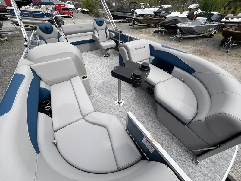 Slide: The Image of Luxurious 2025 Berkshire LE Series 24UL LE pontoon boat interior with plush seating and modern design. - 20