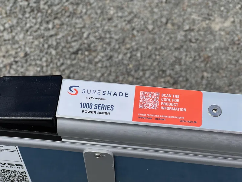 Slide: The Image of SureShade 1000 Series Power Bimini label with QR code for product information. - 23