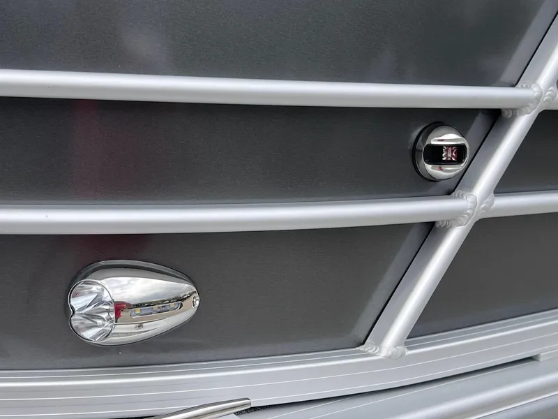 Slide: The Image of 2025 Berkshire LE Series 24UL LE boat detail with sleek metallic finish and modern design elements. - 25