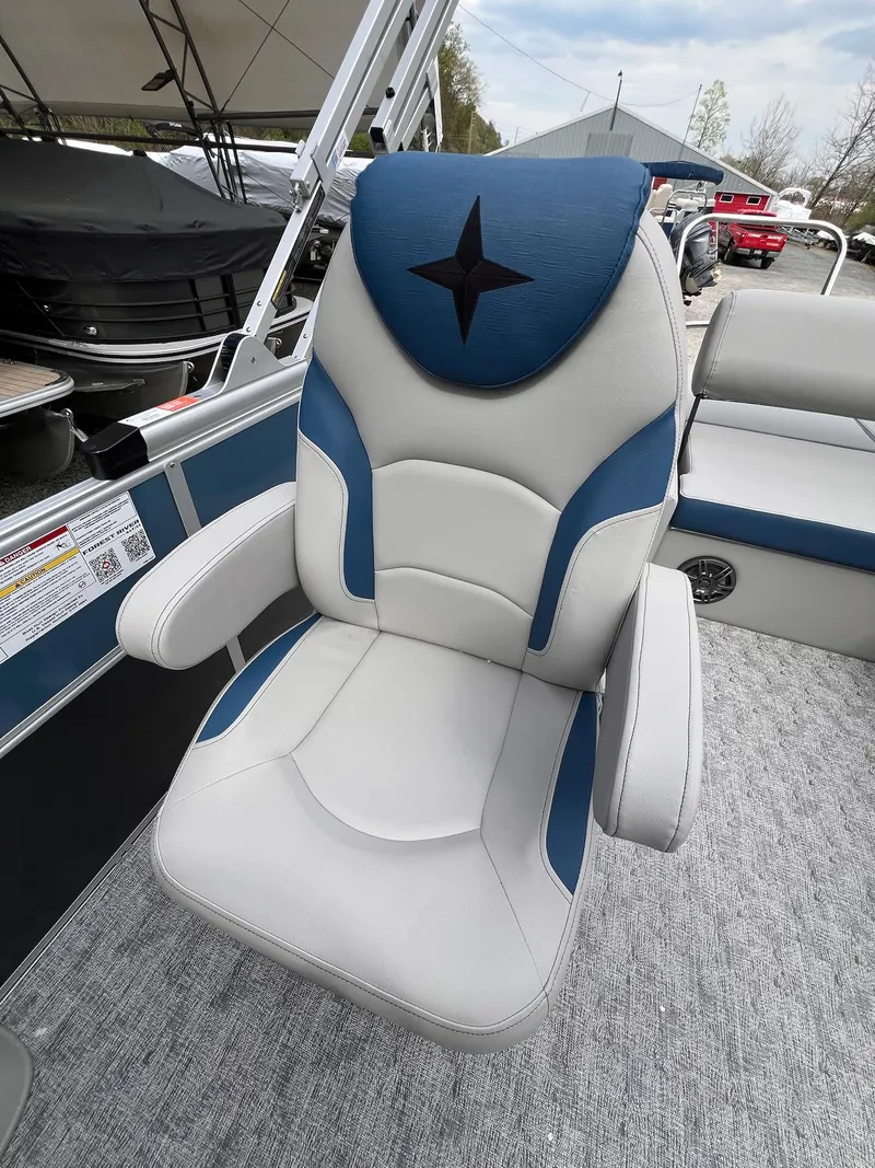 Slide: The Image of 2025 Berkshire LE Series 24UL LE boat seat with blue and white design. - 26