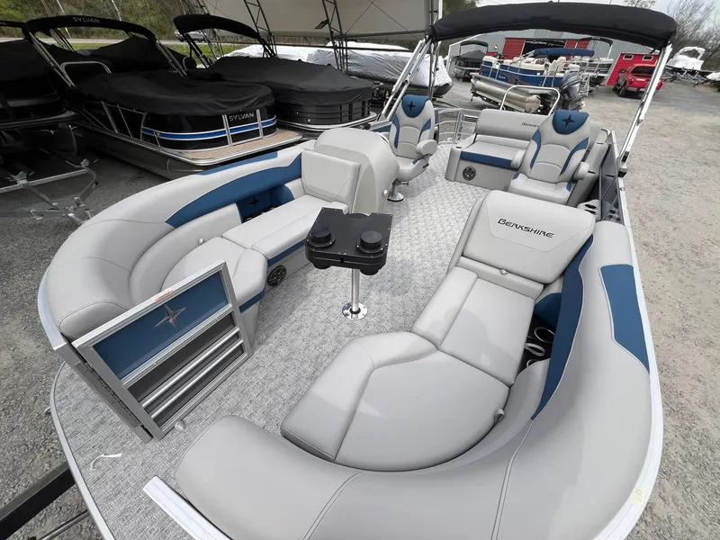 Slide: The Image of 2025 Berkshire LE Series 24UL LE pontoon boat with luxurious seating and modern design. - 4