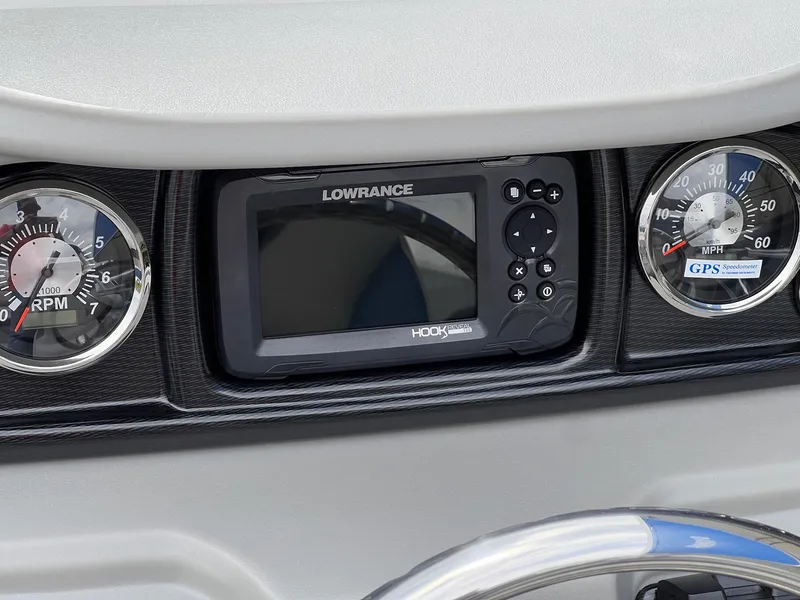 Slide: The Image of Dashboard of 2025 Berkshire LE Series 24UL LE with Lowrance GPS and gauges. - 6