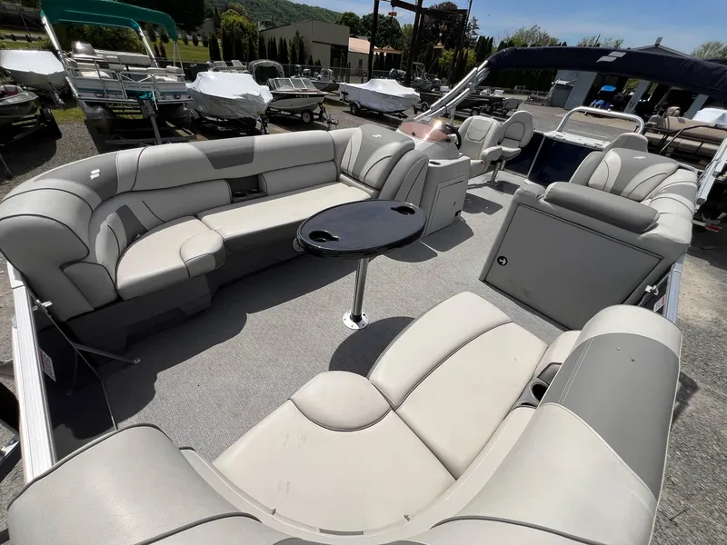 Slide: The Image of 2021 Starcraft EX Fish EX 22 FD pontoon boat with spacious seating and table. - 10
