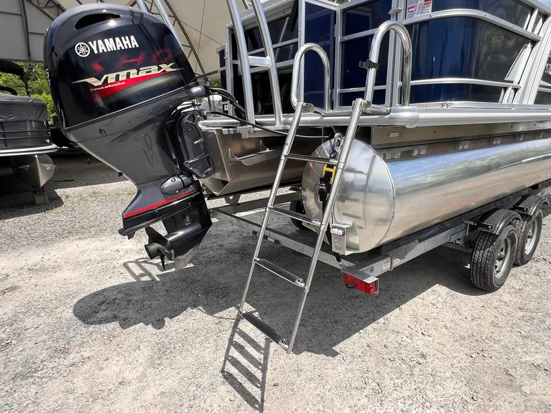Slide: The Image of 2021 Starcraft EX Fish EX 22 FD with Yamaha VMAX engine and ladder on trailer. - 22