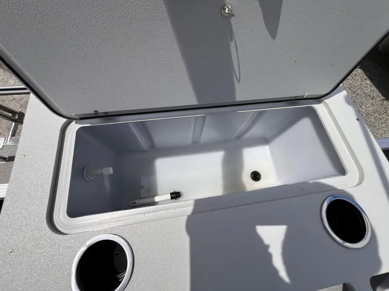 Slide: The Image of Open storage compartment on 2021 Starcraft EX Fish EX 22 FD boat. - 26